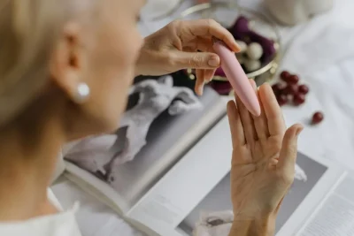 HooHss a woman checking a vibrator