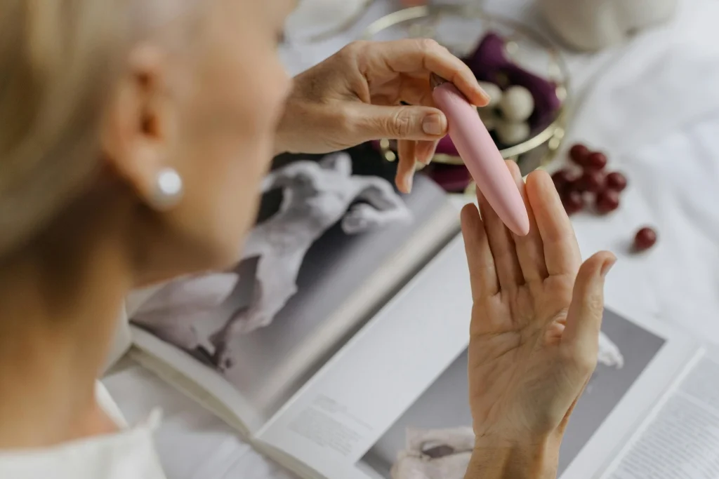 HooHss a woman checking a vibrator