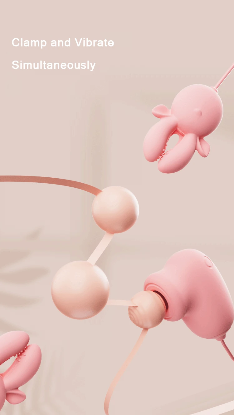 Action shot displaying the simultaneous clamp and vibrate function of the pink intimacy tool, featuring the textured interior of the stimulation "ears."