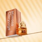 Side view of the Mimosa & Clary Sage essence box and bottle showcasing the elegant branding.