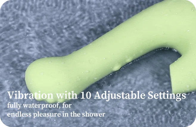 Waterproof HH Little Dino massager submerged in water, illustrating its suitability for bath or shower use.