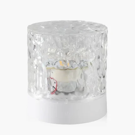 Compact HH water ripple mood light with a textured crystalline acrylic cover and white base for sensory atmosphere.