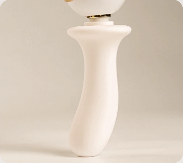 Close-up of premium skin-friendly silicone massage head with flexible curved neck.