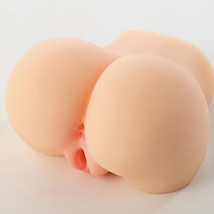 Angled view of dual-channel realistic butt stroker with compact size and rounded curves