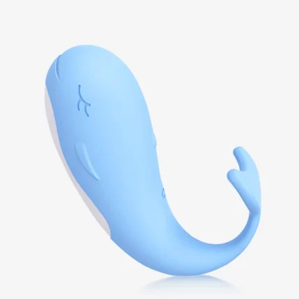 Professional studio shot of the sky blue whale-shaped intimacy tool on a white background, showcasing its seamless medical-grade silicone exterior and sleek profile.