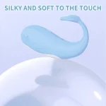 Aesthetic shot of the silky-smooth finish on the HH Adorable Whale clitoral vibrator resting on a reflective surface.