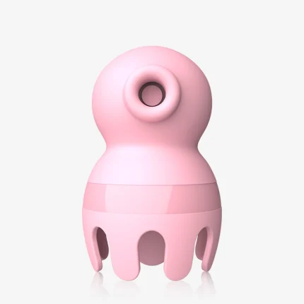 Studio shot of a soft-touch silicone clitoral suction vibrator in pastel pink, featuring a discreet and ergonomic handheld design for solo play.