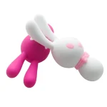 Comparison shot of the pink and white Dorcel bunny vibrators, illustrating the variety of playful colors available for this versatile triple-motor personal massager.