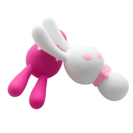Comparison shot of the pink and white Dorcel bunny vibrators, illustrating the variety of playful colors available for this versatile triple-motor personal massager.