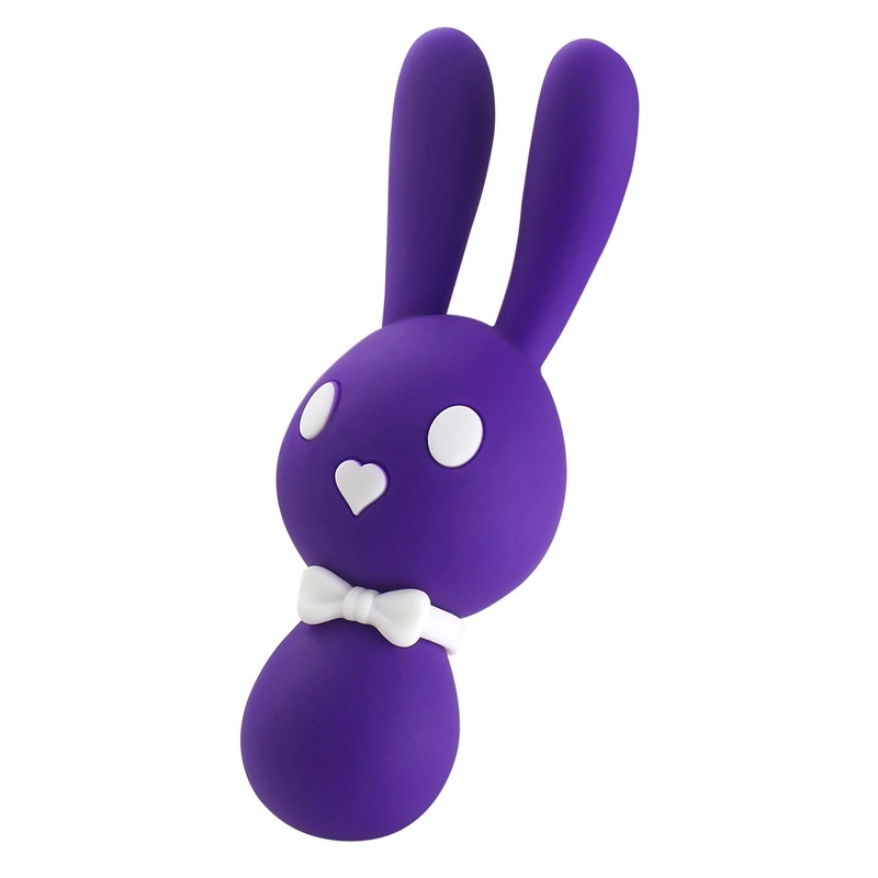 Angled view of the purple bunny-shaped adult toy, emphasizing the soft-touch texture and the distinct white accents for a playful aesthetic.