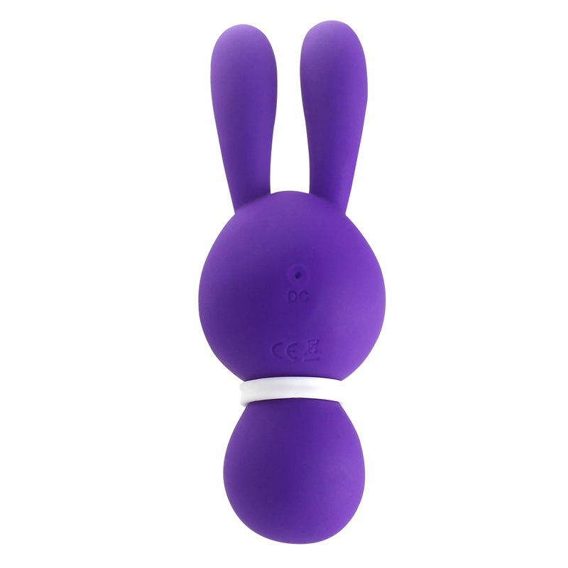 Rear view of the purple Dorcel bunny stimulator, illustrating the location of the magnetic charging contact for easy and hygienic maintenance.