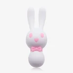 Front view of the white Dorcel bunny vibrator highlighting its adorable aesthetic, featuring pink heart-shaped eyes and a charming bow tie detail at the neck.