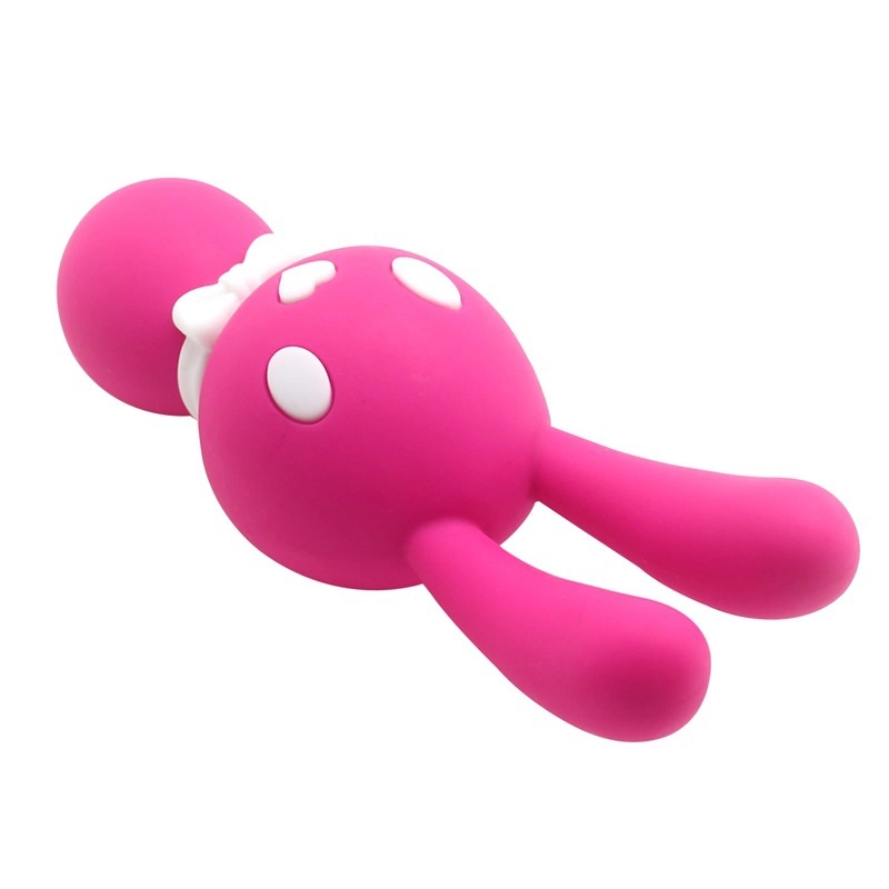 Top-down view of the pink multi-motor massager, focusing on the three-button interface disguised as facial features for discreet operation.