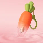 Transparent cutaway view of the carrot-shaped pleasure device revealing the powerful internal motor and weighted mechanism that delivers deep, rumbly vibrations.