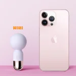 Travel-friendly mini vibrator size comparison next to a smartphone highlighting the ultra-compact and discreet design of this portable pleasure device.