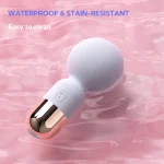 Fully waterproof and stain-resistant purple wand massager submerged in water demonstrating its easy-to-clean medical-grade silicone surface.