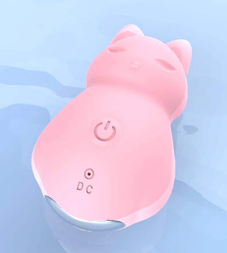 Top-down view of the waterproof pleasure device submerged in water, demonstrating its seamless body-safe silicone construction.