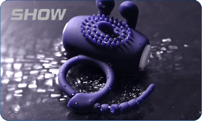 Waterproof pleasure ring with a silicone beaded tail shown in a lifestyle water-splash setting to highlight easy cleaning.