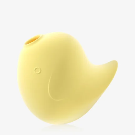 High-resolution studio shot of the yellow bird-shaped clitoral massager against a clean white background, focusing on the seamless medical-grade silicone texture.