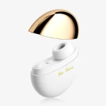 White and gold HH Empress air-pulse massager with the magnetic cap lifted to reveal the soft silicone suction nozzle and control buttons.