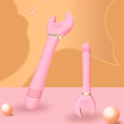Two pink HH-FlexWrench intimacy devices shown in different orientations to highlight the curved handle and dual-tip stimulation head.