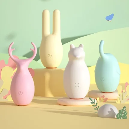 A collection of the HH Forest Elf vibrator set featuring four animal-themed clitoral stimulators in soft pastel colors including pink deer, yellow rabbit, white fox, and mint elephant designs.