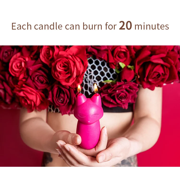 Dual-wick fox temperature play candle held in hands showing a 20-minute burn time for extended intimacy sessions.