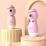 Stylish pink and purple HH Gentleman clitoral stimulators displayed on modern aesthetic pedestals for a premium look.