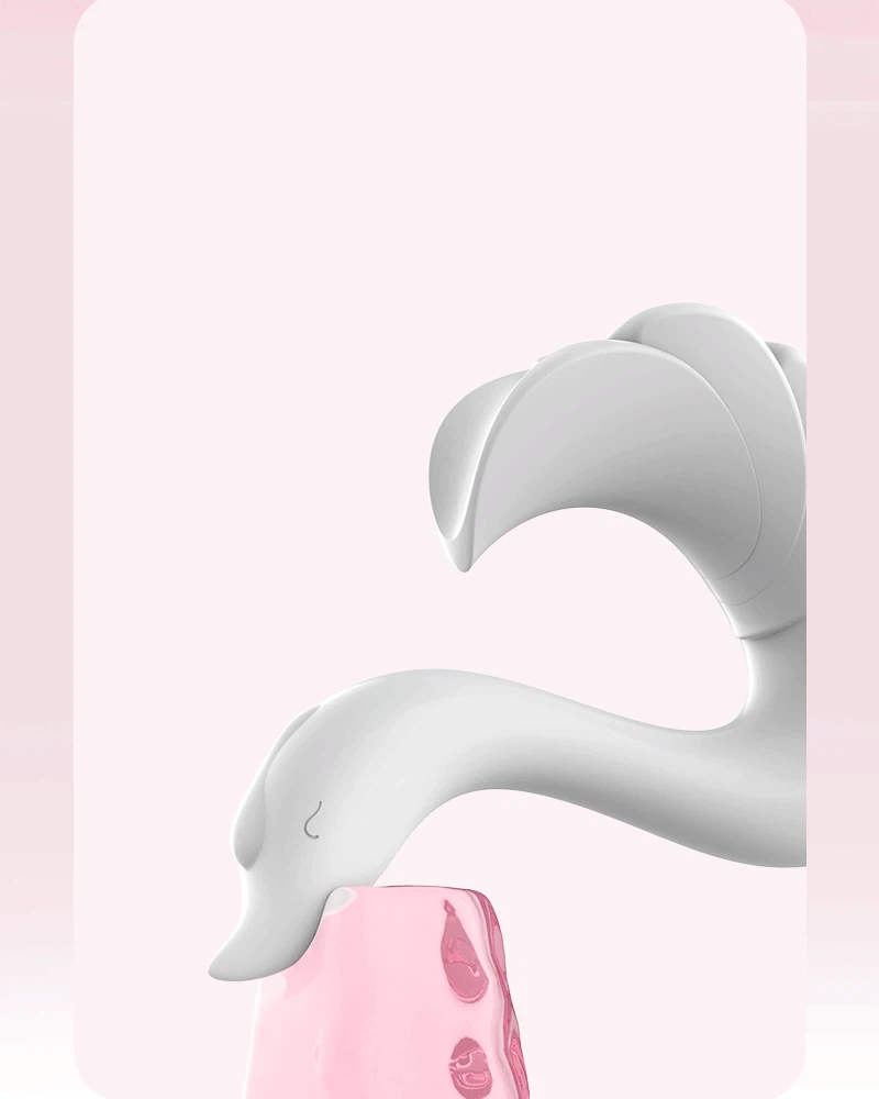 Detail shot of the swan-shaped massage wand’s sleek contours, illustrating its ergonomic design for external and internal use.