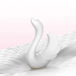 Lightweight and travel-friendly swan pleasure tool resting on a textured surface, highlighting its versatile portability.