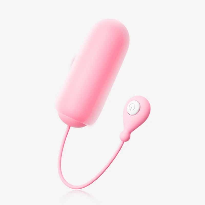 hh-gummy-bullet-gallery-10 Studio shot of a pink handheld pleasure device with a minimalist one-button interface and a flexible connector, isolated on a clean white background.