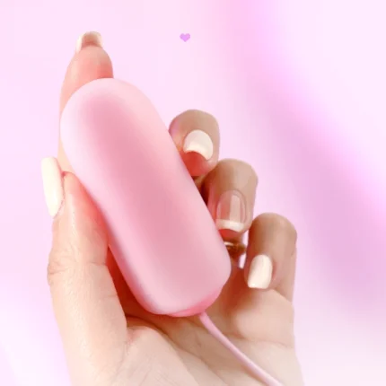 Handheld scale reference for the HH Gummy Bullet showing its compact, travel-friendly size and discreet palm-sized design.