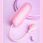 Close-up of a pink waterproof clitoral stimulator featuring a smooth matte finish and a discreet candy-inspired design for personal wellness.