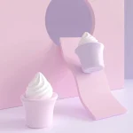 Aesthetic product photography of the pink and purple ice cream scoop vibrators, showcasing the travel-friendly size and modern, artistic design.