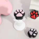 Three decorative paw-print shaped candles in pink, red, and white, designed to create a romantic and themed atmosphere for intimate evenings.