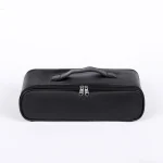 Front view of a black dual-zippered luxury storage case with heart-shaped zipper pulls and a reinforced top handle for easy carrying.