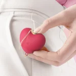 Lifestyle shot demonstrating the compact and portable size of the intimacy toy, easily fitting into a pocket for travel-friendly discretion.