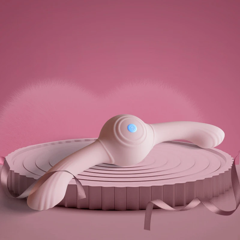 Elegant product display of the Lumina Duet intimacy tool on a tiered pedestal, highlighting its sleek, modern aesthetic and premium build.