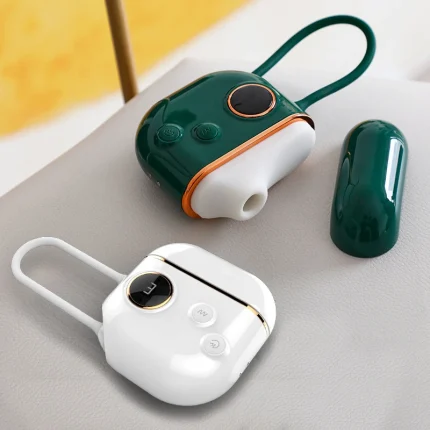 HH Luna Vault 2-in-1 clitoral suction and vibrating pleasure device in emerald green and pearl white options.