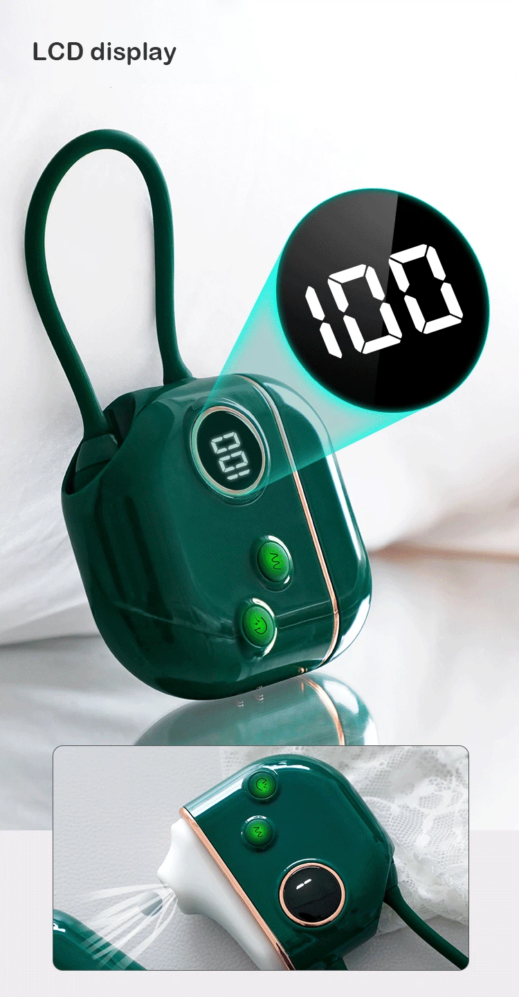 A high-resolution LCD display on the deep green pleasure device showing the battery percentage and current intensity level for precise control.