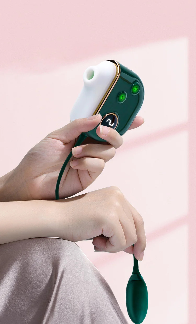 Lifestyle shot of a user holding the ergonomically shaped stimulator, emphasizing the comfortable grip and accessible button layout for solo play.