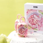 Luxury gift packaging for the Magic Suitcase intimacy device featuring elegant anime cover art and pearl accents.