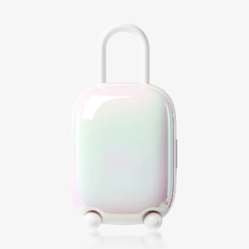 hh-magic-suitcase-7 Minimalist product shot of the pearlescent white Magic Suitcase charging pod with a sleek, luggage-inspired aesthetic.