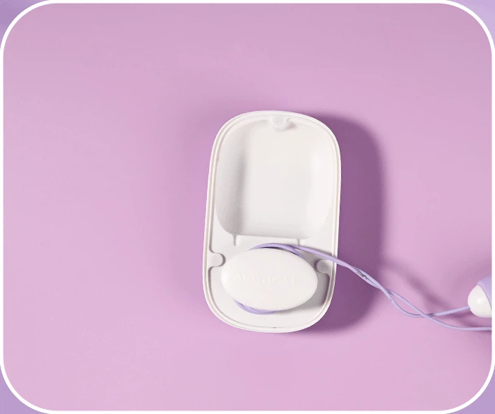 Detail shot of the integrated cable management system within the storage case for organized and tangle-free charging of the intimacy device.