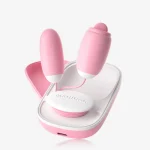 Magical Tongue dual-action clitoral stimulator featuring a pink wearable design with two precision-engineered heads and a sleek charging case.
