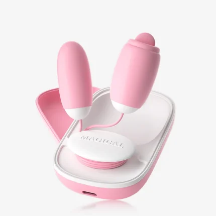 Magical Tongue dual-action clitoral stimulator featuring a pink wearable design with two precision-engineered heads and a sleek charging case.