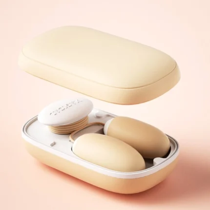 Portable clitoral stimulator set inside its luxury storage box, featuring a compact design perfect for travel-friendly intimacy and organization.