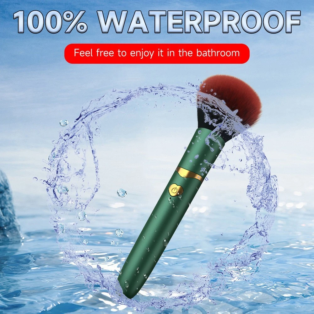 100% waterproof green massage wand being rinsed in water, highlighting its bath-friendly and easy-to-clean design.