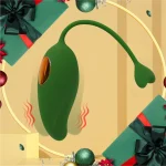 Mango-shaped clitoral vibrator in deep green with festive gift-themed background, highlighting its use as a holiday wellness gift or intimacy accessory.
