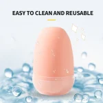 A waterproof TPE male stroker being rinsed under water to demonstrate the easy-to-clean and reusable nature of the product.